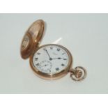Limit gold plated crown winding full hunter pocket watch, having Roman numerals and subsidiary