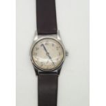 Vintage gents wristwatch with subsidiary seconds dial on a leather strap. Working at lotting up case