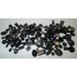 Loose gemstones: mixed onyx, jet and agate panels, some with presumed gold mounts gross weight