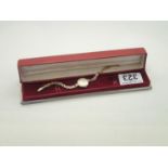 Ladies Rodania 9ct gold wristwatch on a 9ct gold bracelet, total weight 12.7g in original box.