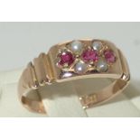 Victorian 15ct gold ruby and pearl ring, size N/O, 1.8g P&P group 1 (£16 for the first item and £1.