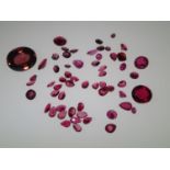Loose gemstones: Rubies, largest stone weighing 18cts and measuring 17 x 14 x 10.5 mm deep Total