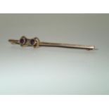 Edwardian 15ct gold amethyst brooch, L: 52 mm, 2.3g Condition Report: One stone chipped, brooch