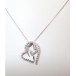 Contemporary 18ct white gold and diamond double heart pendant (which can be split to form two