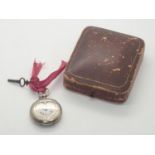 935 silver heart shaped key wind fob watch in a presentation box. Working at lotting. P&P group