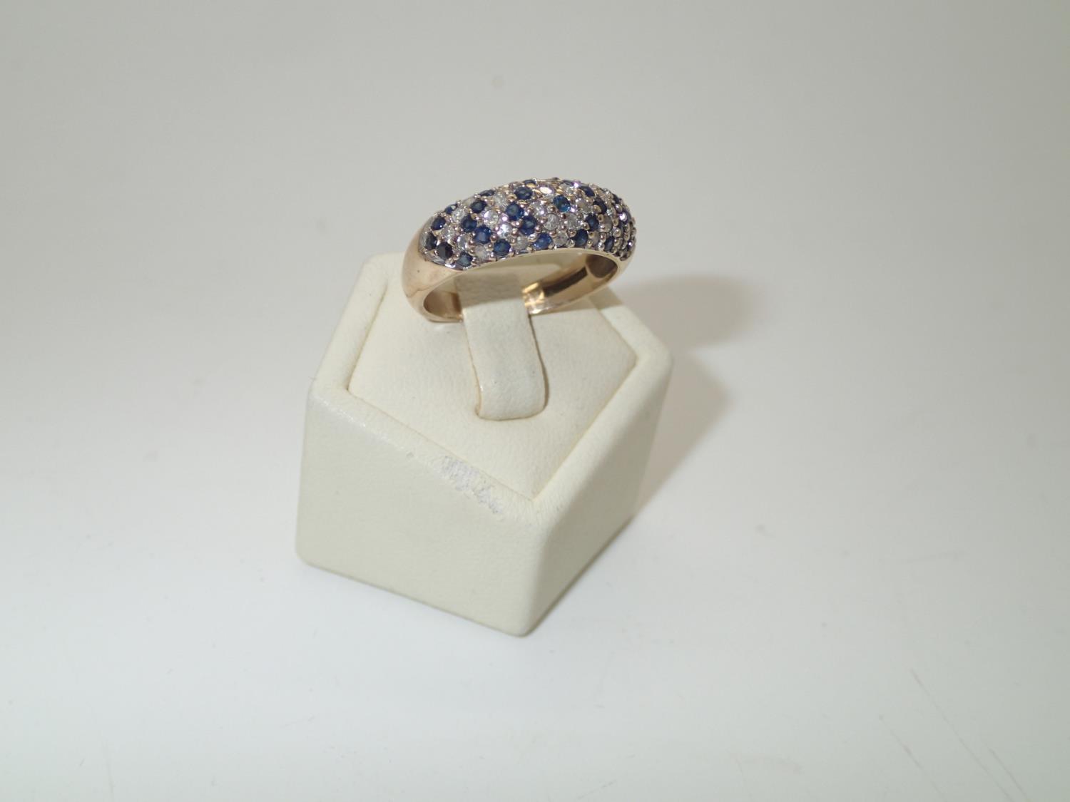 9ct gold sapphire and diamond cluster ring, size O, 3.3g P&P group 1 (£16 for the first item and £