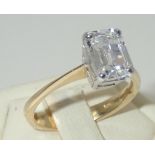 18ct gold solitaire ring set with a large emerald-cut clear stone, size K/L, 3.5g P&P group 1 (£16