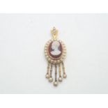 Vintage yellow metal presumed gold cameo and pearl pendant with five graduated drop pearls, 8.5g