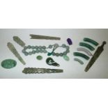 Loose stones: green jade carved panels and beads, with a purple jade head gross weight 77.5g P&P