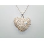 Silver filigree heart pendant and 50 cm chain P&P group 1 (£16 for the first item and £1.50 for