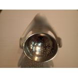 Alessi ceramic and steel strainer. P&P Group 1 (£14+VAT for the first lot and £1+VAT for