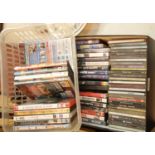 Two boxes of DVDs and CDs. P&P Group 2 (£18+VAT for the first lot and £2+VAT for subsequent lots)