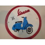 Cast iron metal sign of Vespa scooter D: 24 cm. P&P Group 2 (£18+VAT for the first lot and £2+VAT