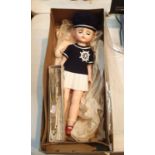 Boxed sailor doll with blonde hair by Fullar and a fan. P&P Group 1 (£14+VAT for the first lot