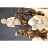 Five Contemporary resin moulded figurines of the female form.This lot is not available for in-
