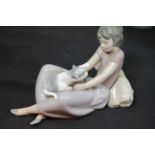 Nao girl with cat figurine, L: 20 cm. P&P Group 1 (£14+VAT for the first lot and £1+VAT for