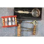 Antique corkscrews , egg timers and a magnifying glass. P&P Group 1 (£14+VAT for the first lot