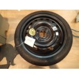 Nissan steel rim spare wheel T105/70 R14. P&P Group 3 (£25+VAT for the first lot and £5+VAT for