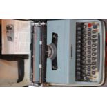 Lettera 32 retro typewriter with case. P&P Group 1 (£14+VAT for the first lot and £1+VAT for