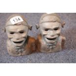 Pair of unpainted Jolly Negro money boxes. Condition report: require extensive restoration. P&P