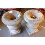 Pair of Grecian type stone cast garden urns, H: 30 cm. This lot is not available for in-house P&P,