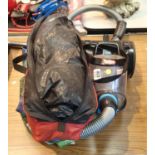 Vax pull along vacuum cleaner, a bag of accessories and a two man tent. This lot is not available