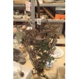 Large wrought iron umbrella stand. This lot is not available for in-house P&P, please contact the