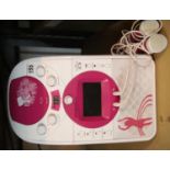 Childs EK karaoke machine with two microphones. This lot is not available for in-house P&P.