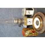 Silver plated and glass antique oil lamp, vintage aneroid barometer, two quartz clocks etc.This