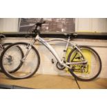 Raleigh 21 speed Shimano mountain bike with front suspension. This lot is not available for in-house