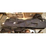Two canvas guitar cases and a canvas gun bag. P&P Group 1 (£14+VAT for the first lot and £1+VAT