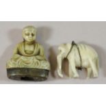 Two small bone figurines, an elephant and a Prayer charm. P&P Group 1 (£14+VAT for the first lot and