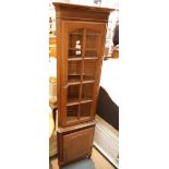 Modern corner cupboard with cane front and shelves. This lot is not available for in-house P&P,