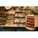 Five souvenir teaspoon display mounts with spoons. (none silver). This lot is not available for in-