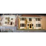 Two early dolls houses with tin plate fronts and three books relating to Dolls Houses. This lot is