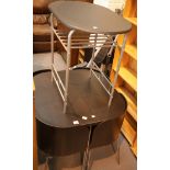 Black kitchen table with four chairs and a metal framed side table. This lot is not available for