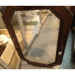 Oak framed octagonal bevelled edge mirror. This lot is not available for in-house P&P, please