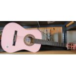 Cased pink six string Herald guitar. P&P Group 2 (£18+VAT for the first lot and £2+VAT for