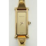 Ladies Gucci 1500L bangle wristwatch P&P group 1 (£16 for the first item and £1.50 for subsequent