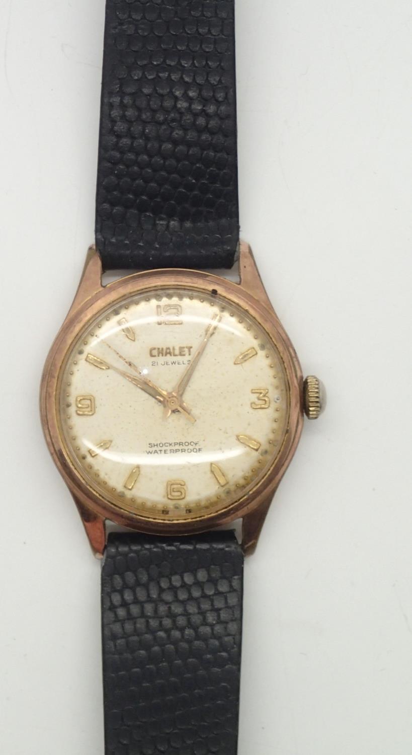 Vintage gents Chalet gold plated 21 jewel wristwatch on a leather strap. Working at lotting. P&P