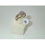 Ladies 9ct gold, diamond cluster ring Size R 2.5g P&P group 1 (£16 for the first item and £1.50