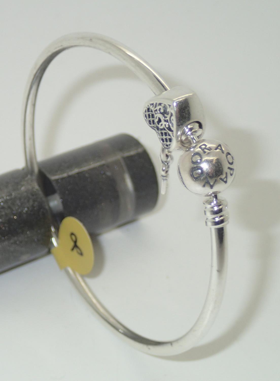 Pandora silver bangle with one charm P&P group 1 (£16 for the first item and £1.50 for subsequent