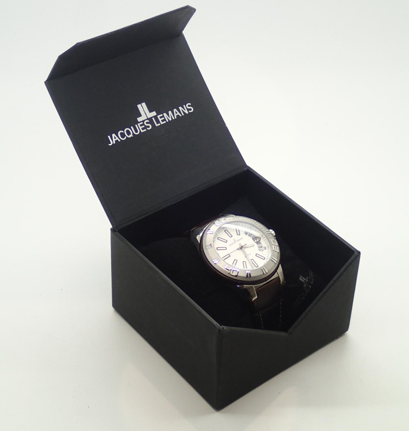 Jacques Le Mans boxed gents wristwatch on a leather strap. Working at lotting. P&P group 1 (£16