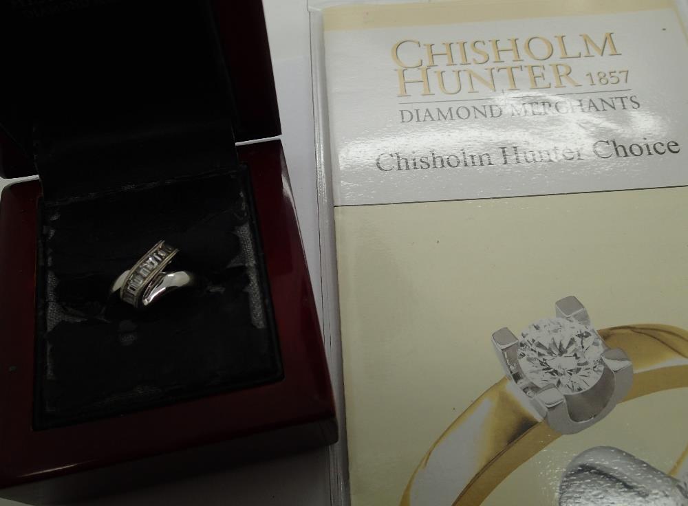 18ct white gold 0.50ct baguette diamond ring size M, with paperwork from Chisholm Hunter, RRP £