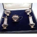 Seven piece hallmarked silver cruet set boxed