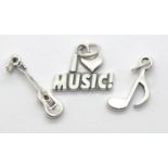 Three silver music charms. P&P Group 1 (£14+VAT for the first lot and £1+VAT for subsequent lots)