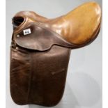 Martin Kinlet brown leather saddle. P&P Group 2 (£18+VAT for the first lot and £2+VAT for subsequent