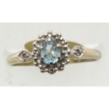 9ct gold blue topaz and diamond set cluster ring, size N, 2.0g. P&P Group 1 (£14+VAT for the first