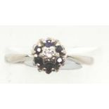 18ct white gold sapphire and diamond cluster ring, size M, 3.2g. P&P Group 1 (£14+VAT for the