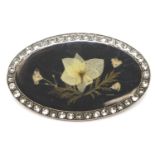 Vintage oval pressed flowers brooch, W: 55 mm. P&P Group 1 (£14+VAT for the first lot and £1+VAT for